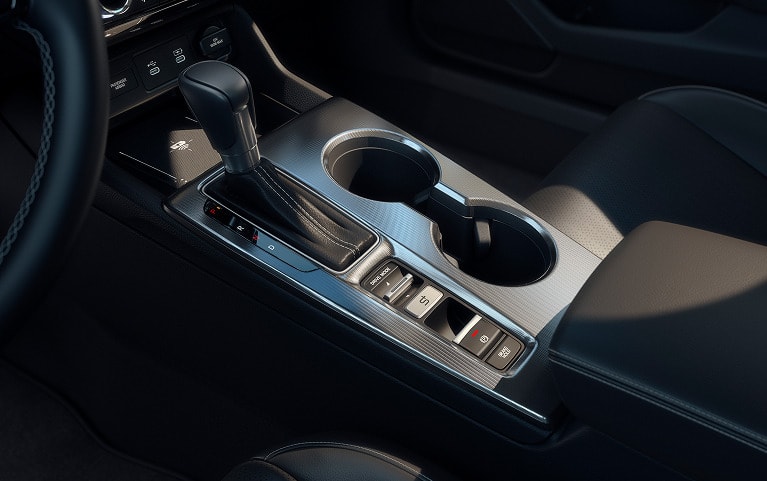  2027 Honda Civic Hatchback center console with gear shift and cup holders (Compact Hatchback).